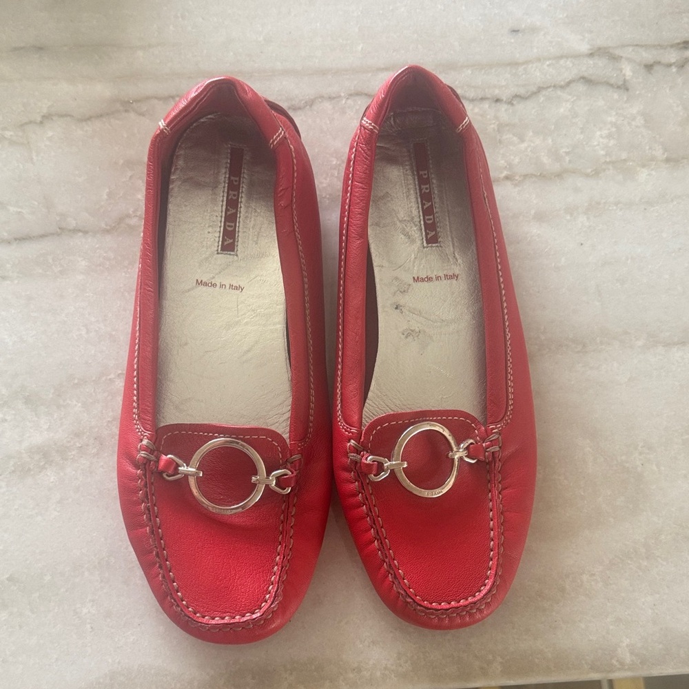 Prada Women's Red Leather Flats with Silver Accents